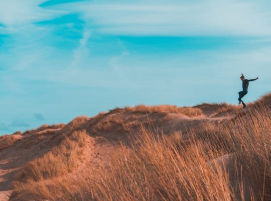 person on brown terrain